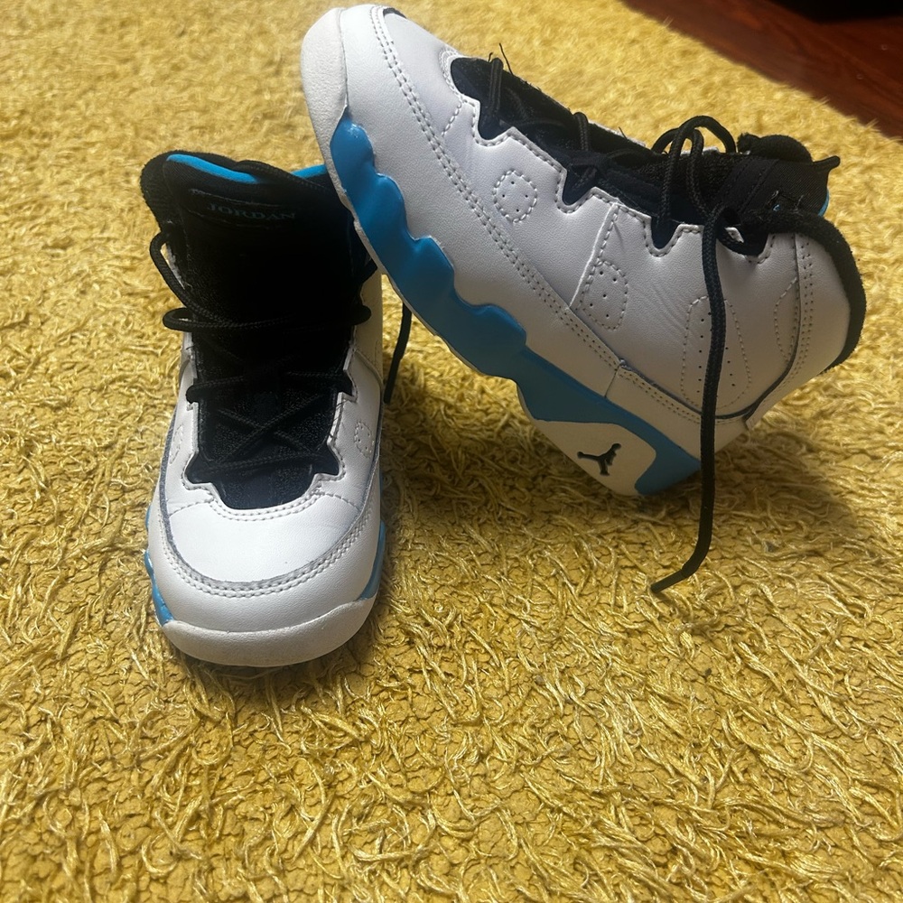 Jordan 9s. White , black and white.